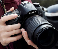 降49美元 Nikon 尼康 D7000 18-55mm+55-300mm双镜头套机 700美元￥4337 送32G卡和相机包